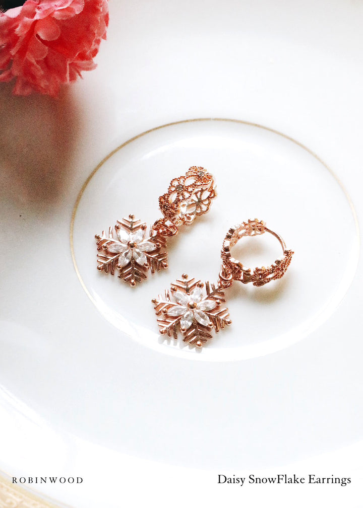 LIMITED COLLECTION'S " DAISY SNOWFLAKE ROSE GOLD EARRINGS , MASTERPIECES, ROBINWOOD