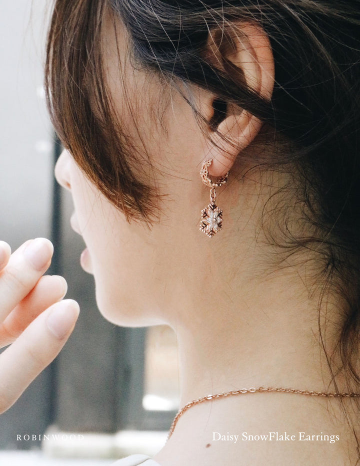 LIMITED COLLECTION'S " DAISY SNOWFLAKE ROSE GOLD EARRINGS , MASTERPIECES, ROBINWOOD
