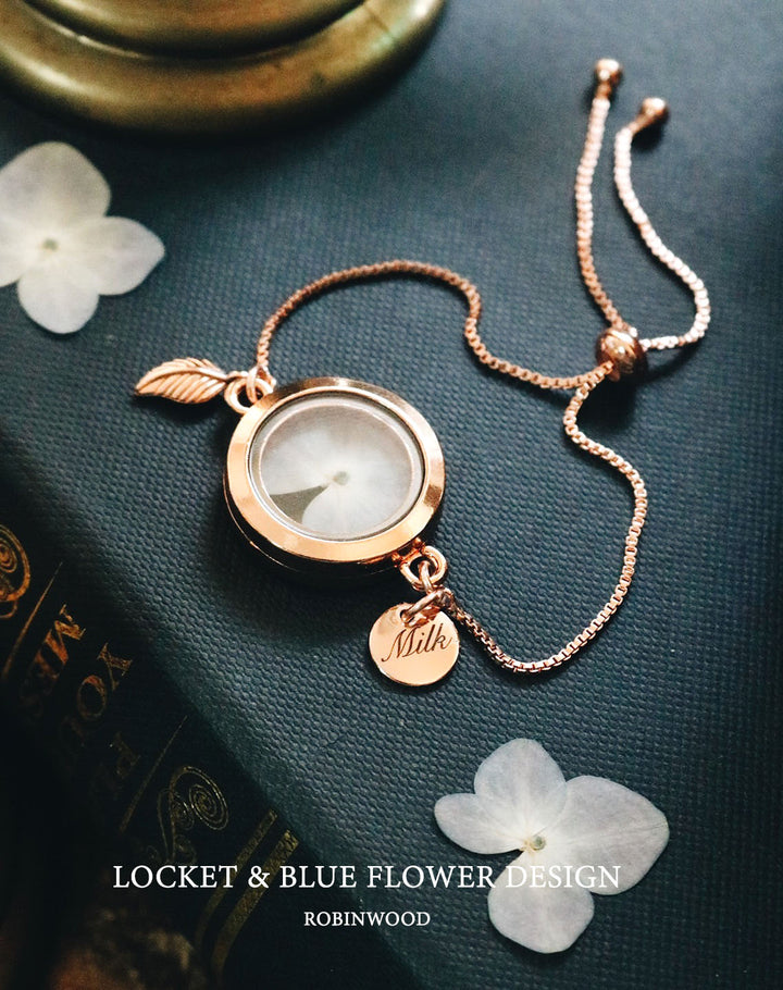 " October Collection's " Rosegold Locket & Snake Chain, White Blue Lilac Flower, Robinwood
