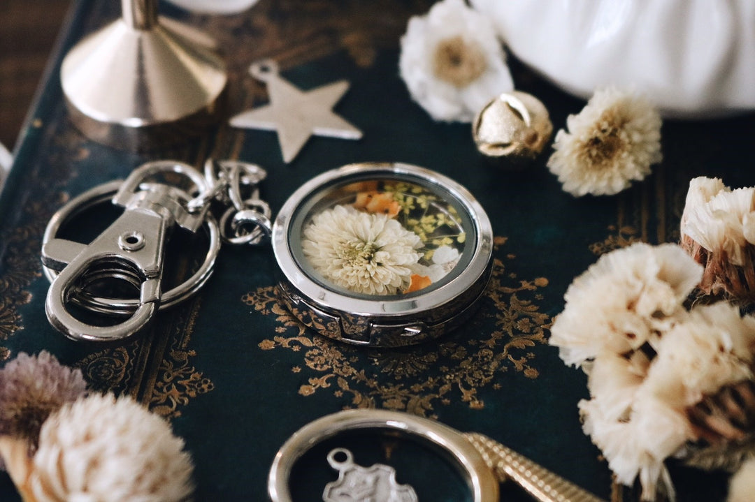 White Carnation flower with yellow queen anne lace and freesia leaf silver locket keychain